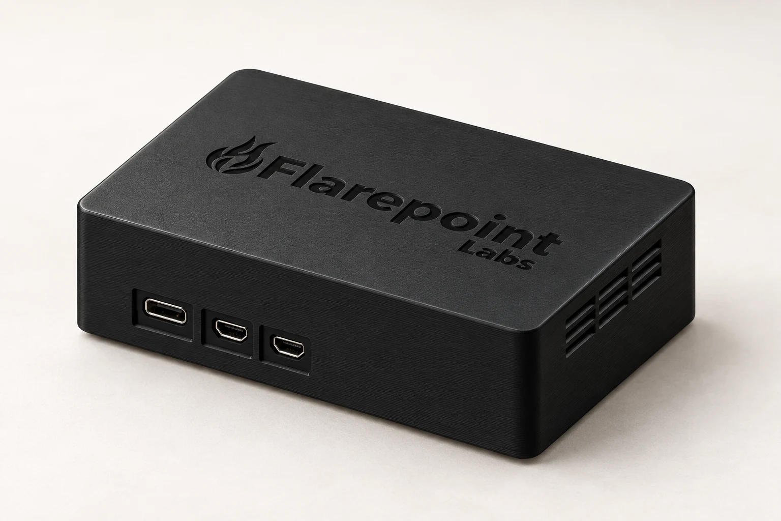 Black Flarepoint Labs media player with recessed logo, USB-C power and two micro-HDMI connections.